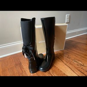 Michael Kors tall lace up rain boots.